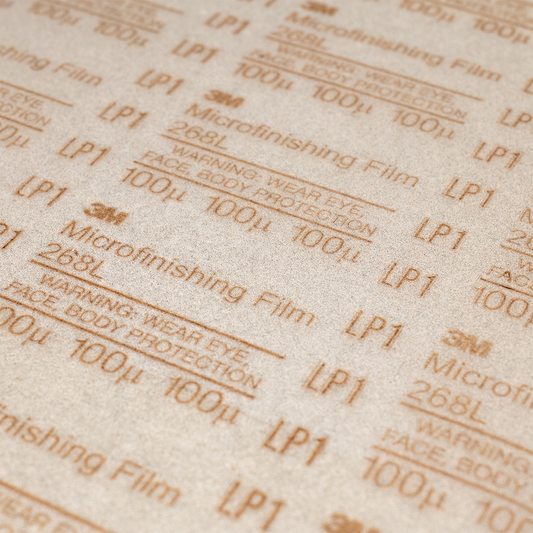 Close-up of the abrasive surface of Dead Sharp 100 micron sharpening film