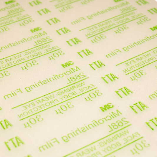 Close-up of the abrasive surface of Dead Sharp 30 micron sharpening film