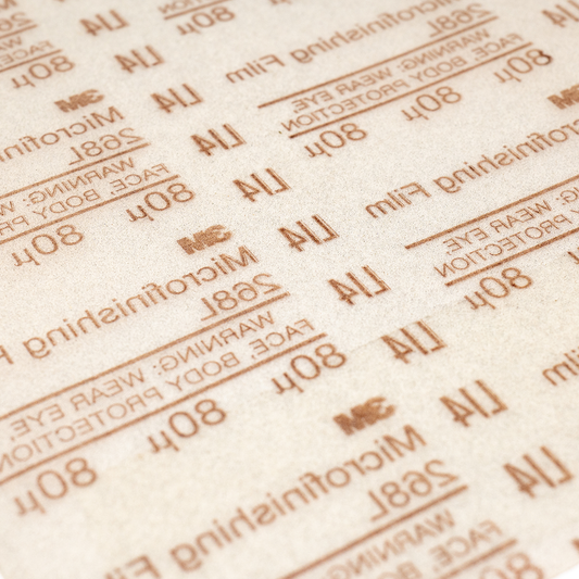 Close-up of the abrasive surface of Dead Sharp 80 micron sharpening film
