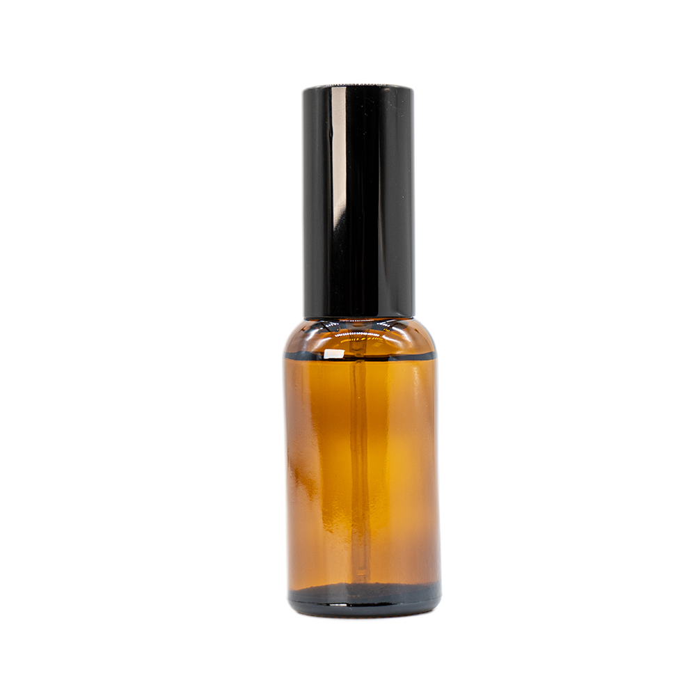 Diamond honing spray in an amber bottle with a black spray cap